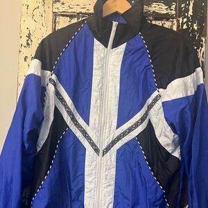 Vintage 90,s women’s nylon track jacket. Size Medium.